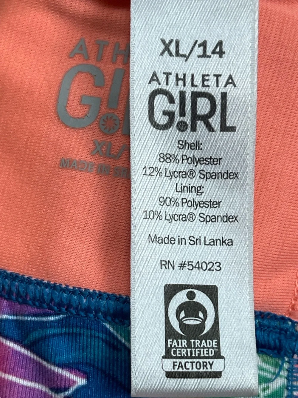 Athleta girl size XL/14 colorful foliage print sports bra